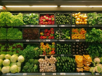 Fresh vegetables and groceries in a market basket — how to eat cheap in Switzerland